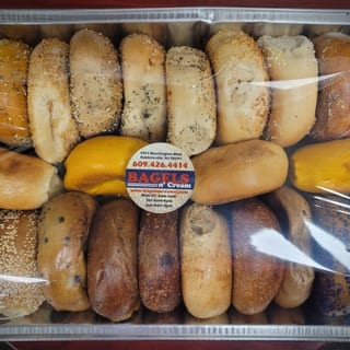 Two Dozen Bagels Sliced/Wrapped in Tray