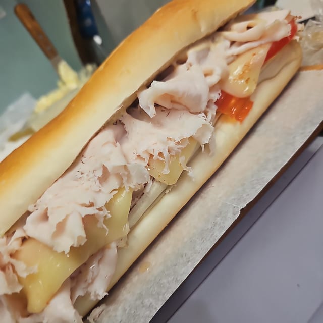 #24 Roasted Turkey Breast, Melted Mozzarella Cheese Sandwich.